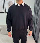 Boxy fit black polo sweatshirt